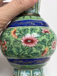 A Chinese Canton enamel green-ground three-piece altar set, 19th C.