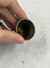 A varied collection of 14 Tibetan ritual utensils, 19/20th C.