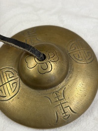 A varied collection of 14 Tibetan ritual utensils, 19/20th C.