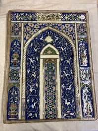 A very large inscribed rectangular moulded Qajar 'mihrab' tile inscribed Sultan Abu Saeed Khan, 19th C.