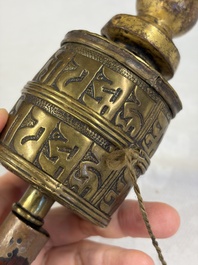 A varied collection of 14 Tibetan ritual utensils, 19/20th C.