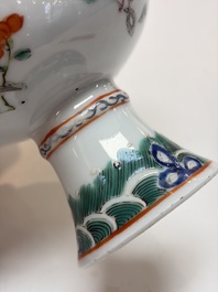 A Chinese famille rose celadon-ground hexagonal vase and a famille rose stem bowl, 19th C.