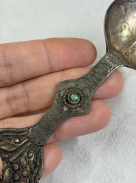A varied collection of 14 Tibetan ritual utensils, 19/20th C.