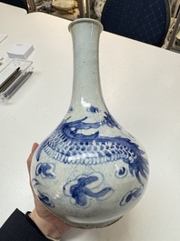 A Korean blue and white 'Dragon' bottle vase, Joseon, 19th C.