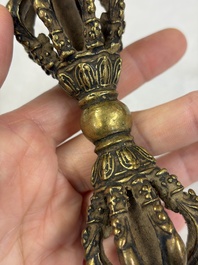 A varied collection of 14 Tibetan ritual utensils, 19/20th C.