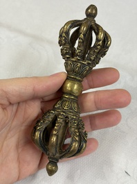 A varied collection of 14 Tibetan ritual utensils, 19/20th C.