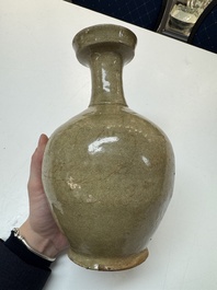 A Korean celadon-glazed sake bottle, Goryeo, 11th C.