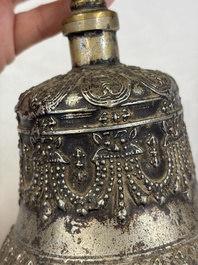A varied collection of 14 Tibetan ritual utensils, 19/20th C.