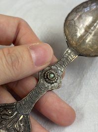 A varied collection of 14 Tibetan ritual utensils, 19/20th C.