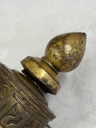 A varied collection of 14 Tibetan ritual utensils, 19/20th C.