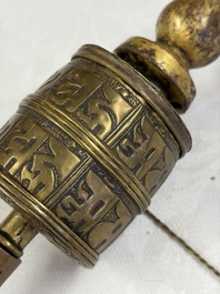 A varied collection of 14 Tibetan ritual utensils, 19/20th C.