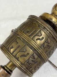 A varied collection of 14 Tibetan ritual utensils, 19/20th C.