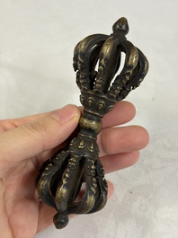 A varied collection of 14 Tibetan ritual utensils, 19/20th C.