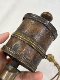 A varied collection of 14 Tibetan ritual utensils, 19/20th C.
