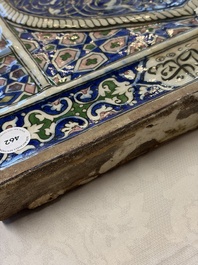 A very large inscribed rectangular moulded Qajar 'mihrab' tile inscribed Sultan Abu Saeed Khan, 19th C.