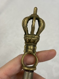 A varied collection of 14 Tibetan ritual utensils, 19/20th C.