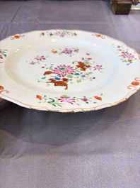 17 Chinese blue, white and famille rose plates and an Imari-style tea caddy, Kangxi/Qianlong