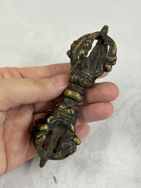 A varied collection of 14 Tibetan ritual utensils, 19/20th C.