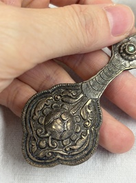 A varied collection of 14 Tibetan ritual utensils, 19/20th C.