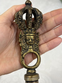 A varied collection of 14 Tibetan ritual utensils, 19/20th C.