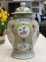 A Chinese famille rose vase and cover with birds among flowering branches, 19th C.
