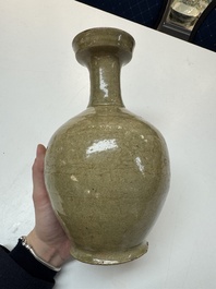 A Korean celadon-glazed sake bottle, Goryeo, 11th C.