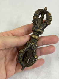 A varied collection of 14 Tibetan ritual utensils, 19/20th C.