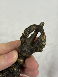 A varied collection of 14 Tibetan ritual utensils, 19/20th C.
