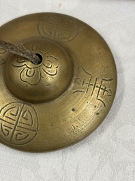 A varied collection of 14 Tibetan ritual utensils, 19/20th C.