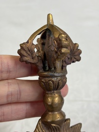 A varied collection of 14 Tibetan ritual utensils, 19/20th C.