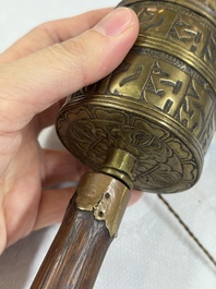 A varied collection of 14 Tibetan ritual utensils, 19/20th C.