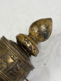 A varied collection of 14 Tibetan ritual utensils, 19/20th C.