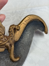 A varied collection of 14 Tibetan ritual utensils, 19/20th C.