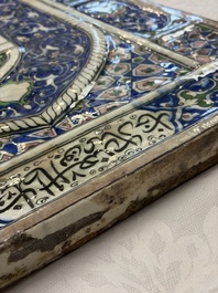 A very large inscribed rectangular moulded Qajar 'mihrab' tile inscribed Sultan Abu Saeed Khan, 19th C.