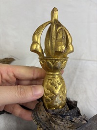 A varied collection of 14 Tibetan ritual utensils, 19/20th C.