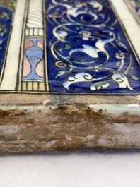 A very large inscribed rectangular moulded Qajar 'mihrab' tile inscribed Sultan Abu Saeed Khan, 19th C.