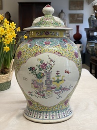 A Chinese famille rose vase and cover with birds among flowering branches, 19th C.