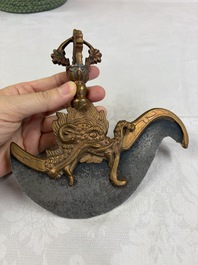 A varied collection of 14 Tibetan ritual utensils, 19/20th C.
