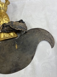 A varied collection of 14 Tibetan ritual utensils, 19/20th C.