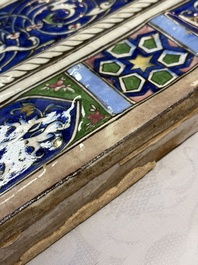 A very large inscribed rectangular moulded Qajar 'mihrab' tile inscribed Sultan Abu Saeed Khan, 19th C.