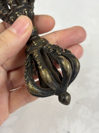 A varied collection of 14 Tibetan ritual utensils, 19/20th C.