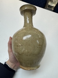 A Korean celadon-glazed sake bottle, Goryeo, 11th C.