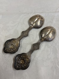 A varied collection of 14 Tibetan ritual utensils, 19/20th C.