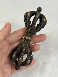 A varied collection of 14 Tibetan ritual utensils, 19/20th C.