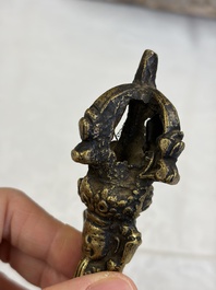 A varied collection of 14 Tibetan ritual utensils, 19/20th C.