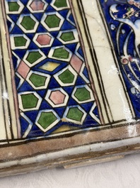 A very large inscribed rectangular moulded Qajar 'mihrab' tile inscribed Sultan Abu Saeed Khan, 19th C.