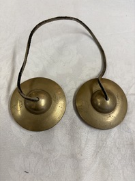 A varied collection of 14 Tibetan ritual utensils, 19/20th C.