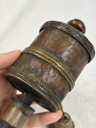 A varied collection of 14 Tibetan ritual utensils, 19/20th C.
