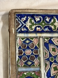 A very large inscribed rectangular moulded Qajar 'mihrab' tile inscribed Sultan Abu Saeed Khan, 19th C.