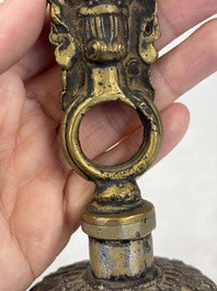 A varied collection of 14 Tibetan ritual utensils, 19/20th C.